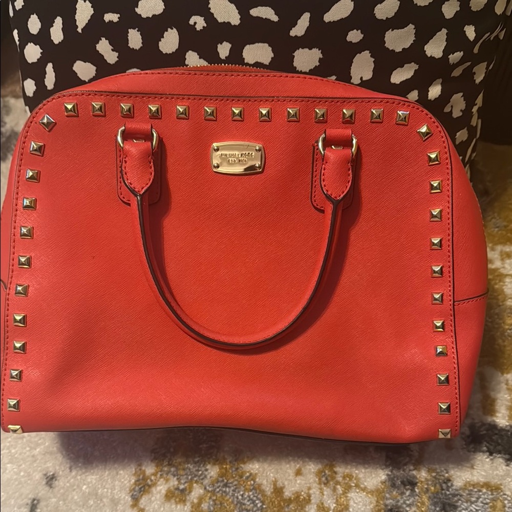 Bright colored Michael Kors bag with gold accents & detachable strap!